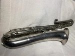 C. G. Conn Elkhart Indiana Bass Saxophone Silver Plate Bell Professional Case. Fixed Price $9999.99.