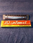 Diplomat Harmonica 32 Holes 16 Reed Made In Japan By Tokunaga Musical Co. 6.25". Fixed Price $20.00.