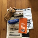 1) Hohner Blues Harp Harmonica (c) Books An Cases Made In Germany And Usa. Fixed Price $20.00.