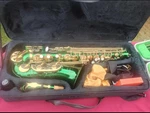 Mendini By Cecilio Green Gold Closed Alto Saxophone With Case. Fixed Price $225.00.